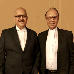 R.K. Naroola & Udayan Mukerji,Senior Partners