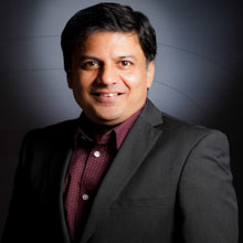  Kamal Oza,  Co-Founder & Director