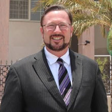  Justin McCauley,    Principal