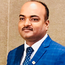  Suresh B Angadi,  CEO