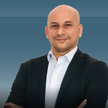  Banarji Bhaskaran,    CEO