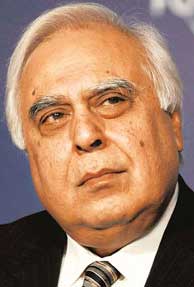 Govt. outcasts DMK, puts Sibal in charge of Telecom Ministry