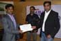 Bhaskar Raju, Lead Engineer working for Pilani Soft Labs being rewarded by one of our prestigious jury - Jayashankar Divi, Sr. Architect for Platform Engineering at MetricStream
