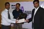 Mritunjay Kumar, Software Engineer at Webcom Information Technology being awarded by Jayashankar Divi, Sr. Architect for Platform Engineering at MetricStream.